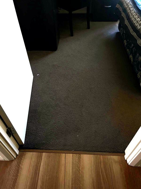 Bedroom carpet vacuumed